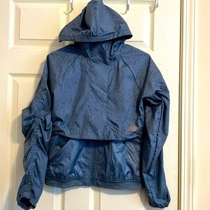 New balance 2 in 1  running jacket. Size XS. Worn once. Lots of pockets.
